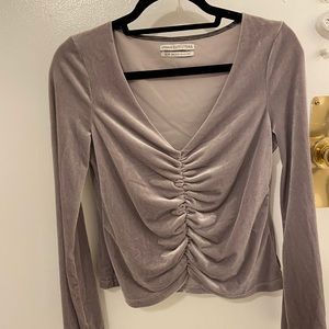 Silver velvet cinched long sleeve top.